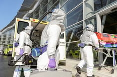 bigstock-HAZMAT-team-with-stretcher-and-65375563.jpg