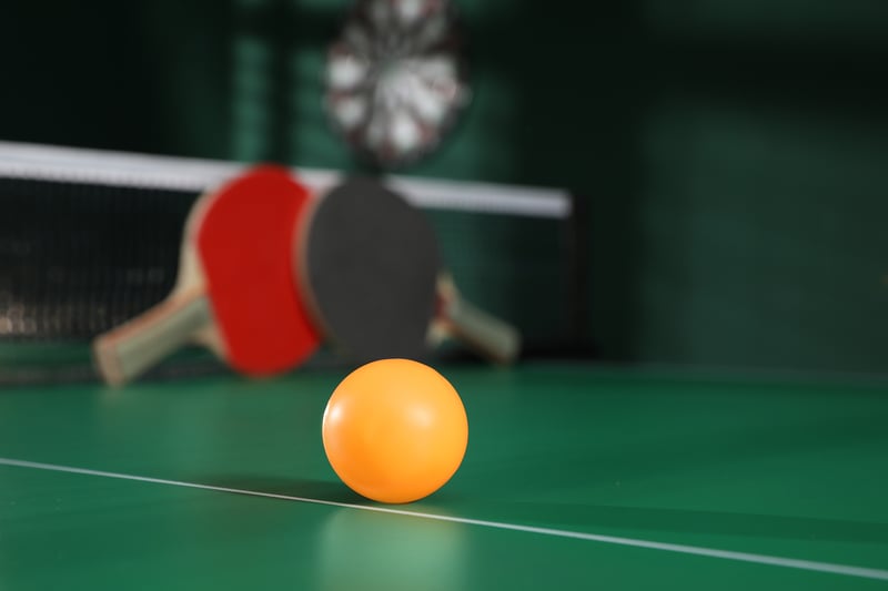 Orange-Ball-On-Green-Ping-Pong